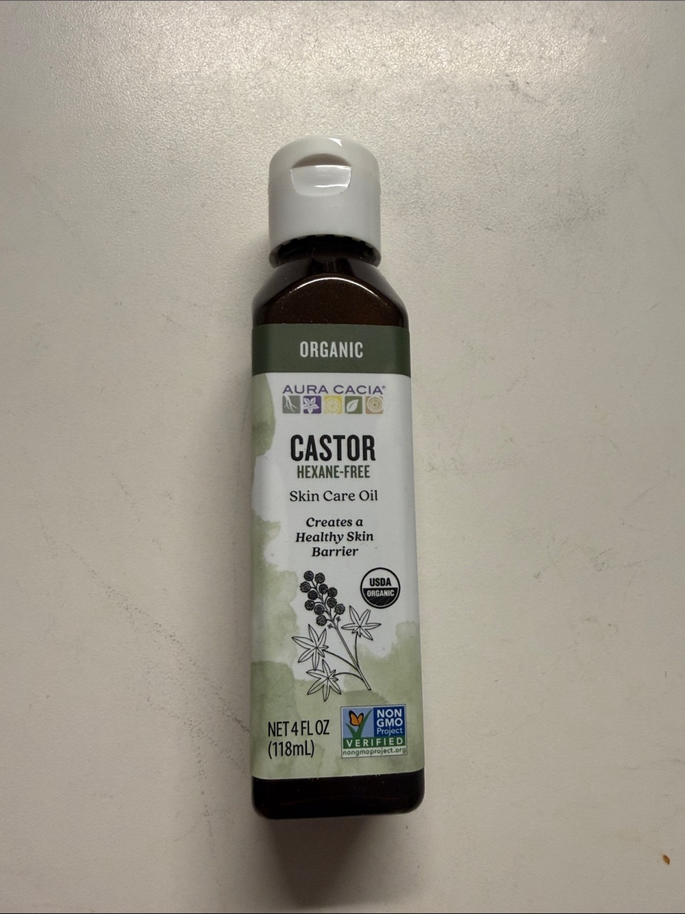 Aura Castor Skin Care Oil Bottle — White, Green, Brown